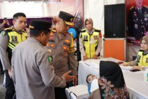 Cooling System, Polda Kalteng Gelar Bakti Kesehatan dan Bakti Sosial di Pelabuhan Rambang