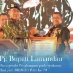 Peringati Hari Jadi Brimob, Pj Bupati Lamandau Terima Penghargaan